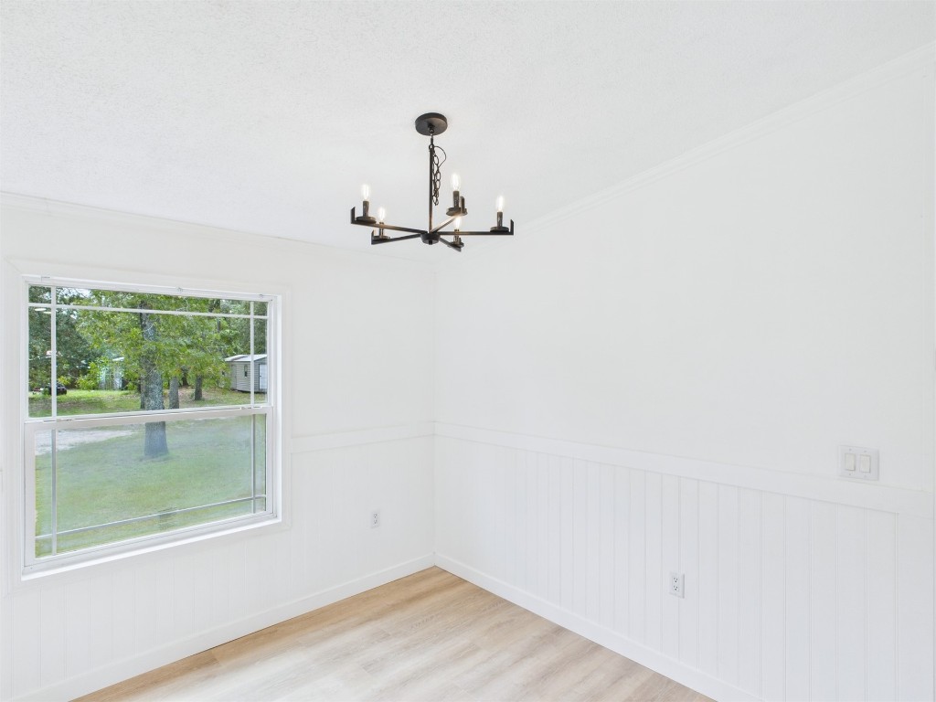 85490 Alene Road Yulee, FL 32097 - Photo 19 of 49 a view of a small space with wooden floor and a window