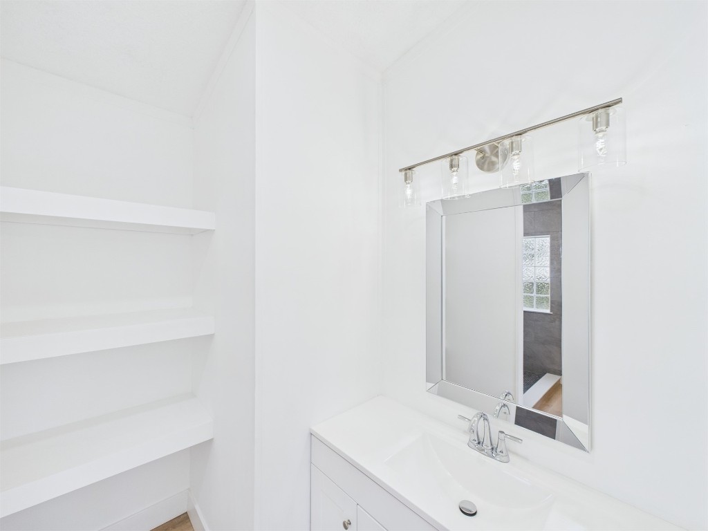 85490 Alene Road Yulee, FL 32097 - Photo 24 of 49 a bathroom with a sink and a mirror