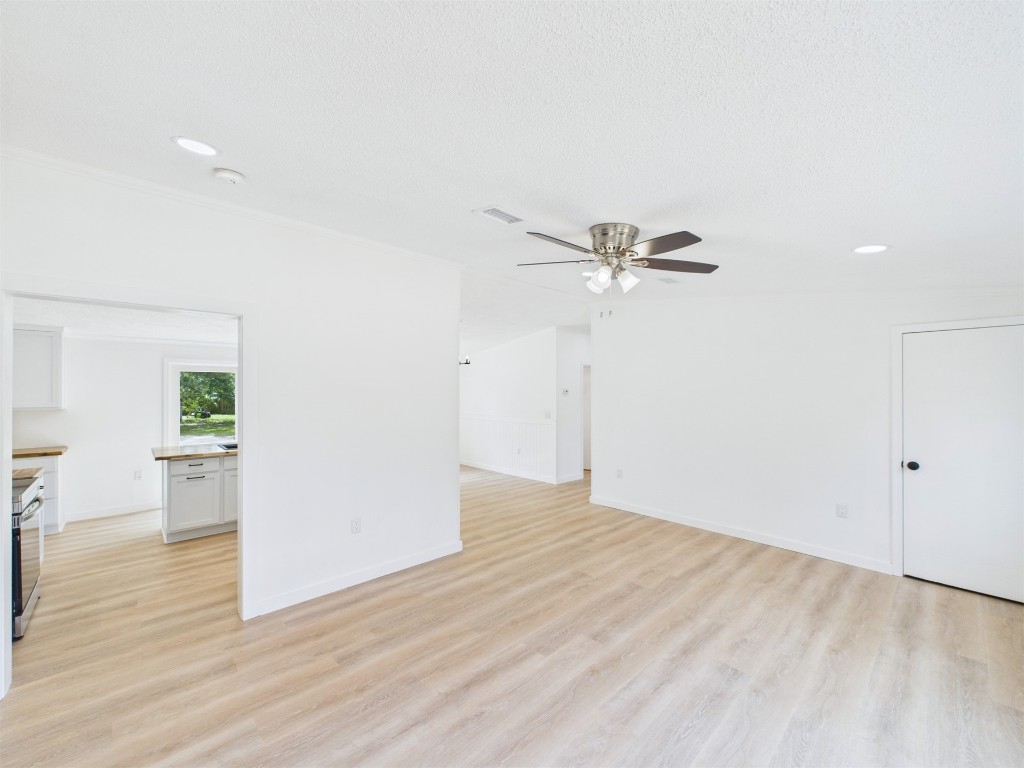 85490 Alene Road Yulee, FL 32097 - Photo 25 of 49 a view of empty room with wooden floor