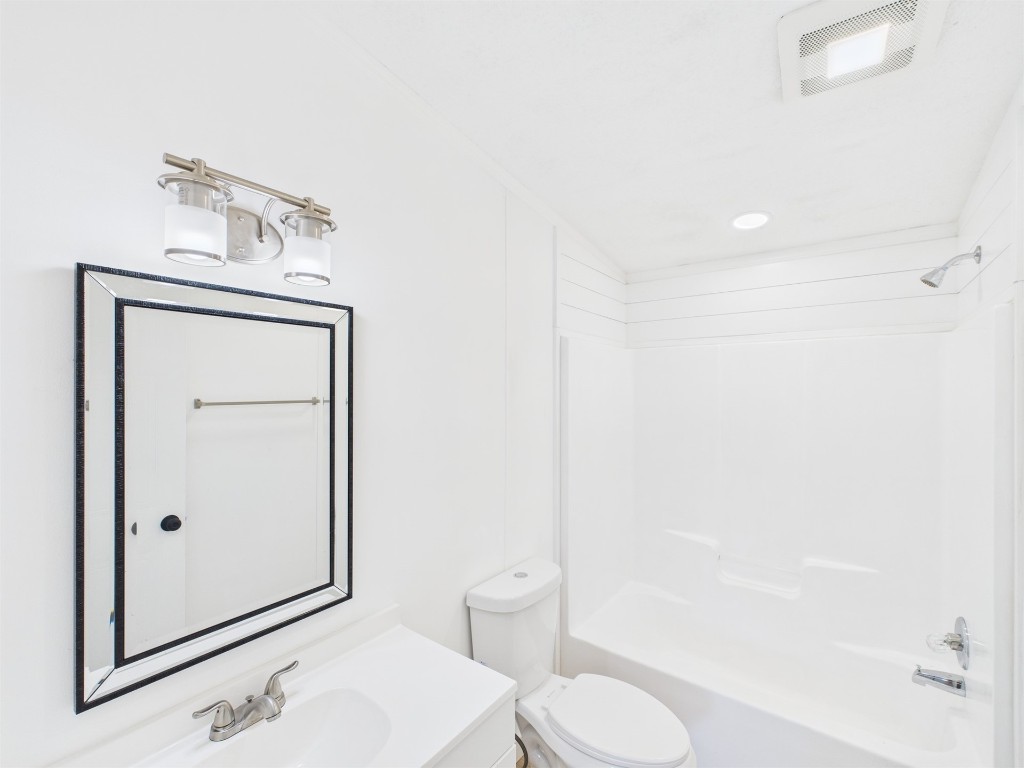 85490 Alene Road Yulee, FL 32097 - Photo 28 of 49 a bathroom with a toilet a sink and shower