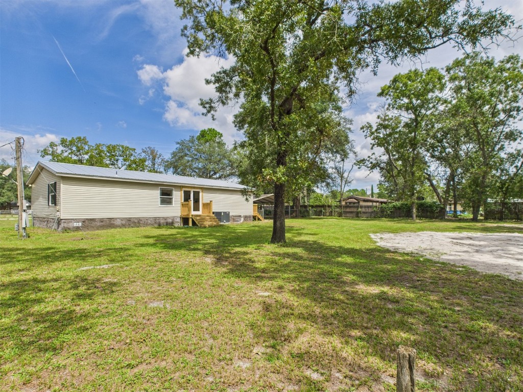85490 Alene Road Yulee, FL 32097 - Photo 39 of 49 a view of a house with a backyard