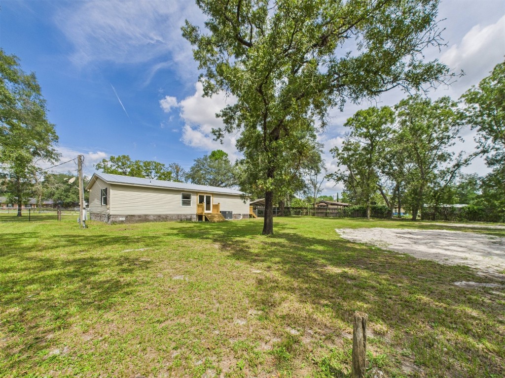 85490 Alene Road Yulee, FL 32097 - Photo 40 of 49 a view of a house with a big yard