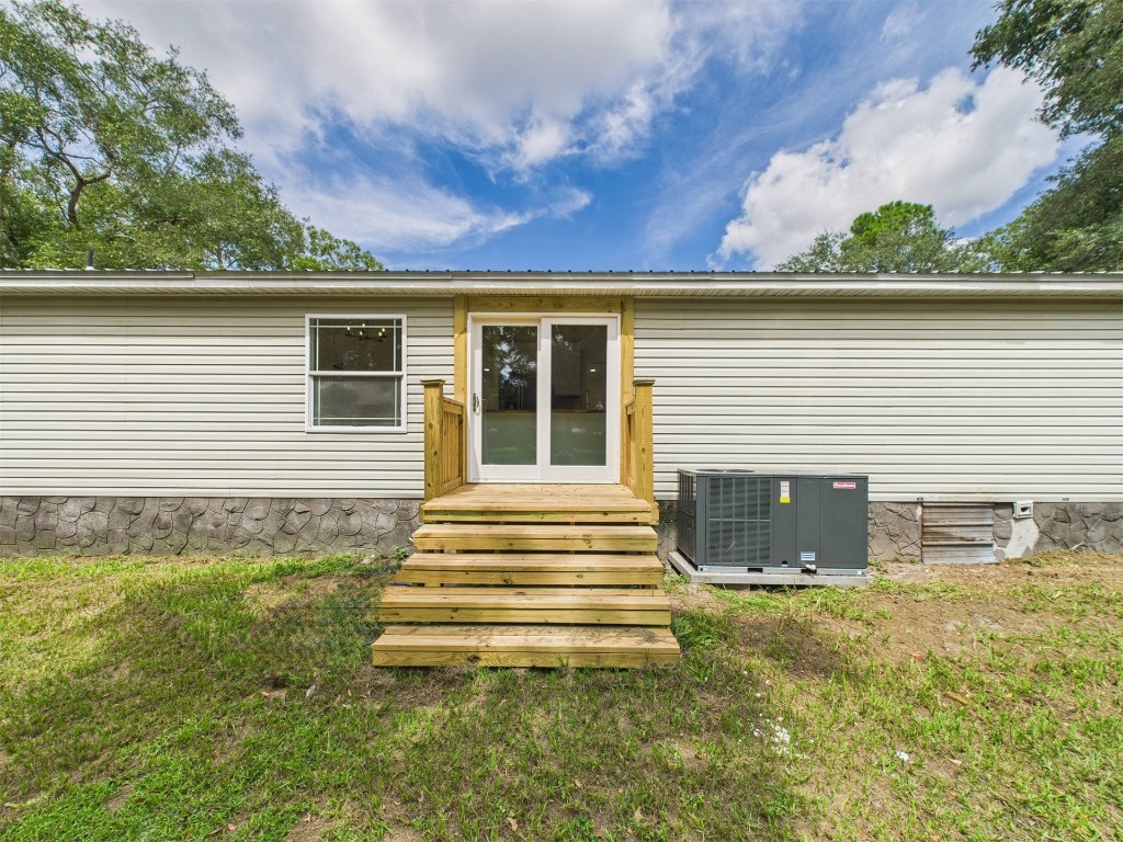 85490 Alene Road Yulee, FL 32097 - Photo 48 of 49 a view of a house with a yard