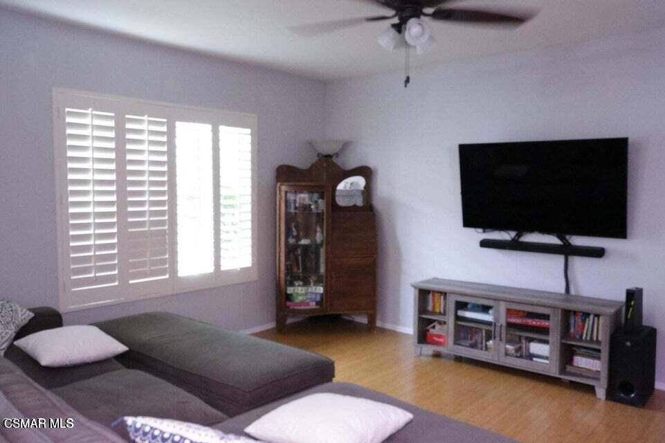 2388 Royal Avenue, Unit 26 Simi Valley, CA 93065 - Photo 6 of 11 a living room with furniture and a flat screen tv