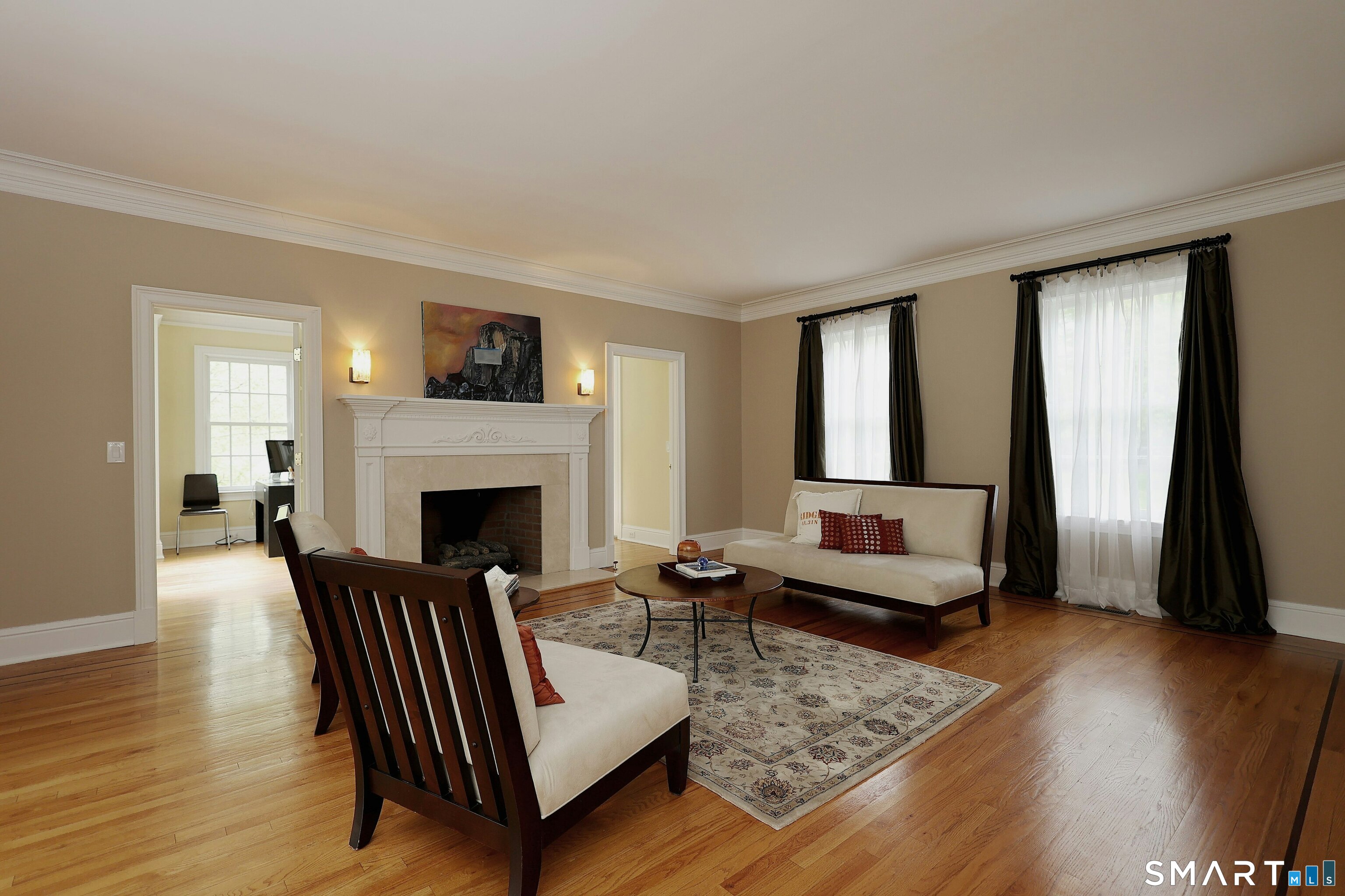 30 Whipstick Road Ridgefield, CT 06877 - Photo 13 of 40 a living room with furniture and a fireplace