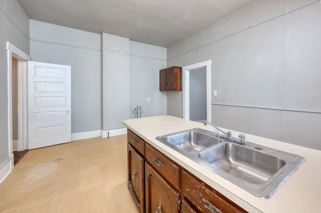 2904 Beacon Avenue Columbus, GA 31904 - Photo 14 of 39 a bathroom with a sink and a mirror