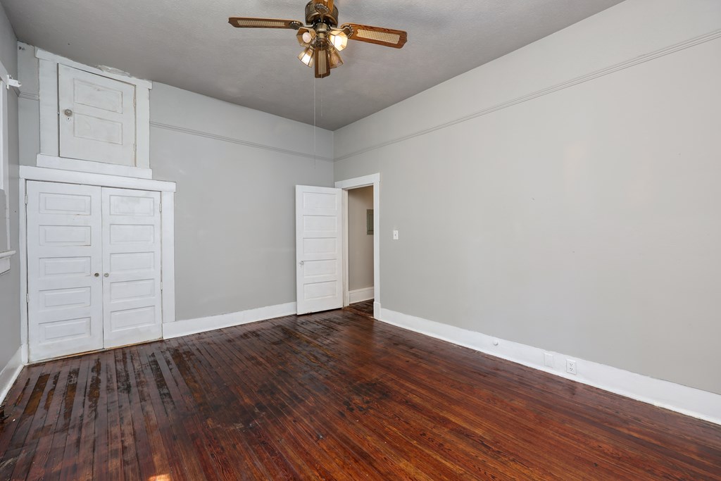 2904 Beacon Avenue Columbus, GA 31904 - Photo 18 of 39 a view of an empty room with wooden floor