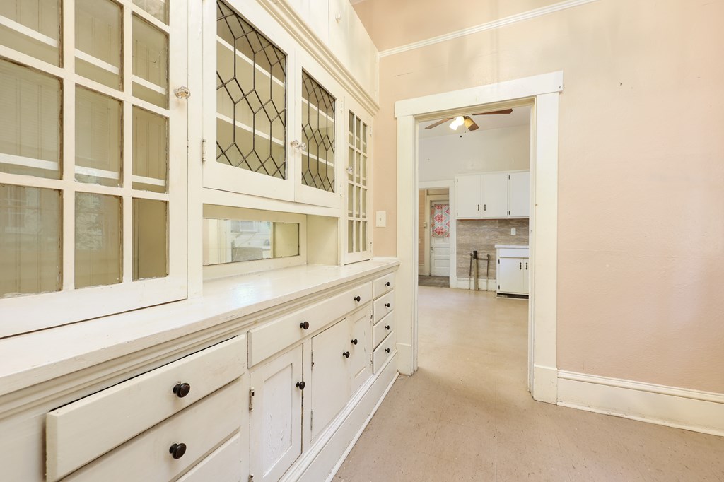 2904 Beacon Avenue Columbus, GA 31904 - Photo 25 of 39 a view of an entryway with wooden floor and a cabinet