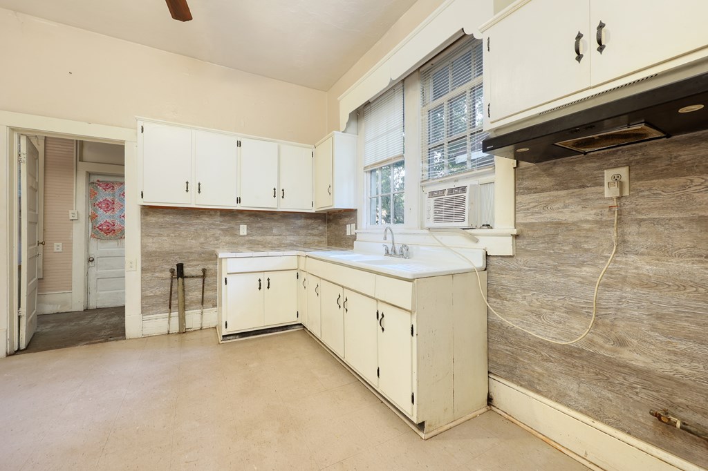 2904 Beacon Avenue Columbus, GA 31904 - Photo 27 of 39 a kitchen with stainless steel appliances granite countertop a stove and a refrigerator