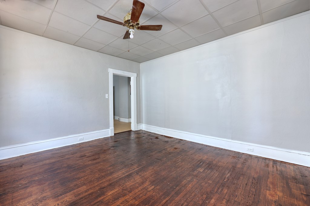 2904 Beacon Avenue Columbus, GA 31904 - Photo 10 of 39 a view of an empty room with wooden floor