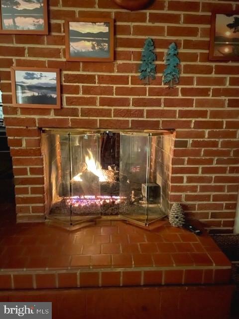 6903 Rosemont Drive McLean, VA 22101 - Photo 12 of 32 2-sided gas fireplace