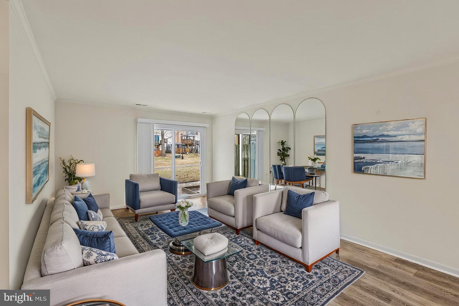 10 Kettle Court, Unit 76F Windsor Mill, MD 21244 - Photo 12 of 29 a living room with furniture chess board and a rug