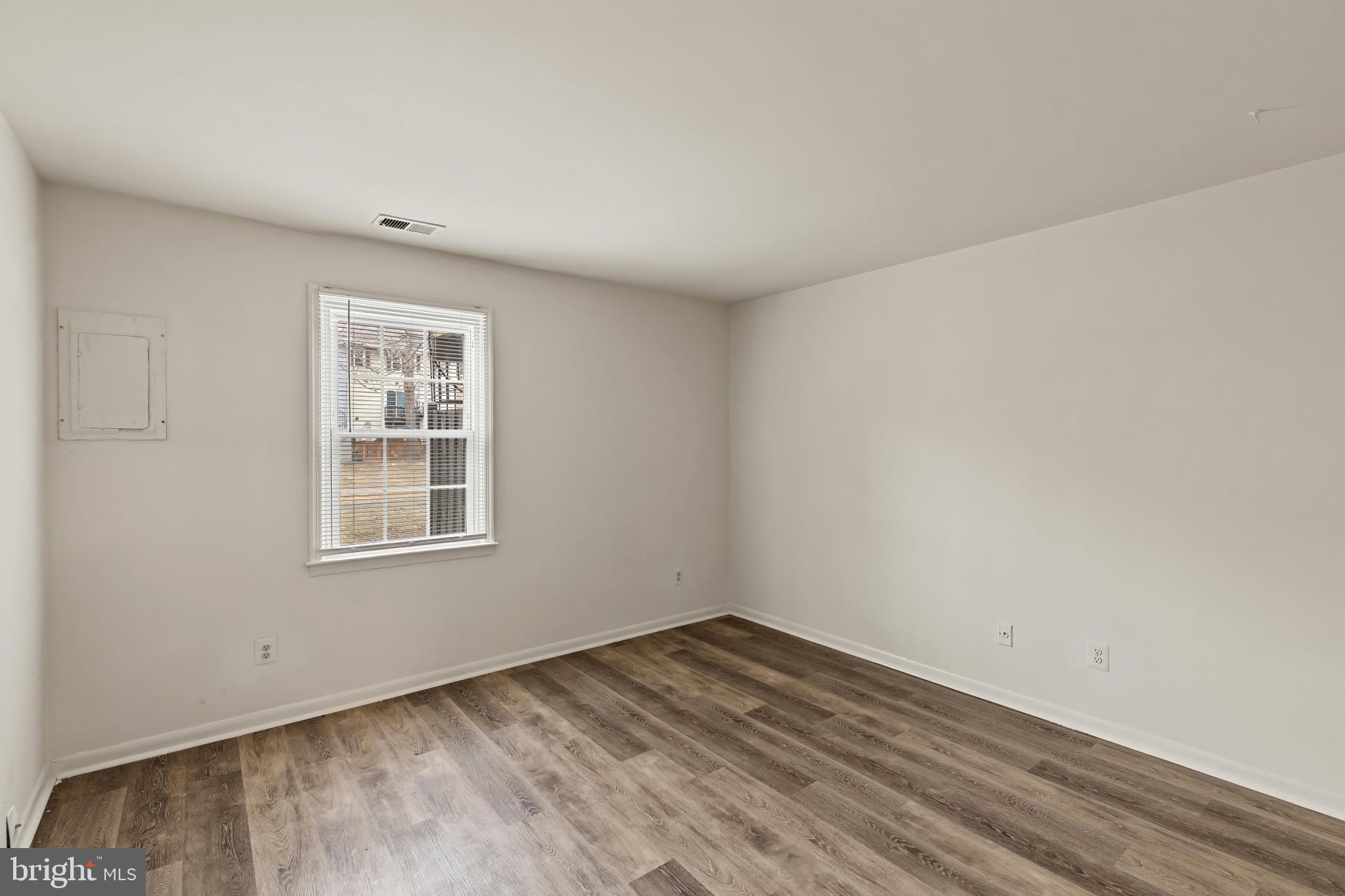 10 Kettle Court, Unit 76F Windsor Mill, MD 21244 - Photo 23 of 29 an empty room with a window