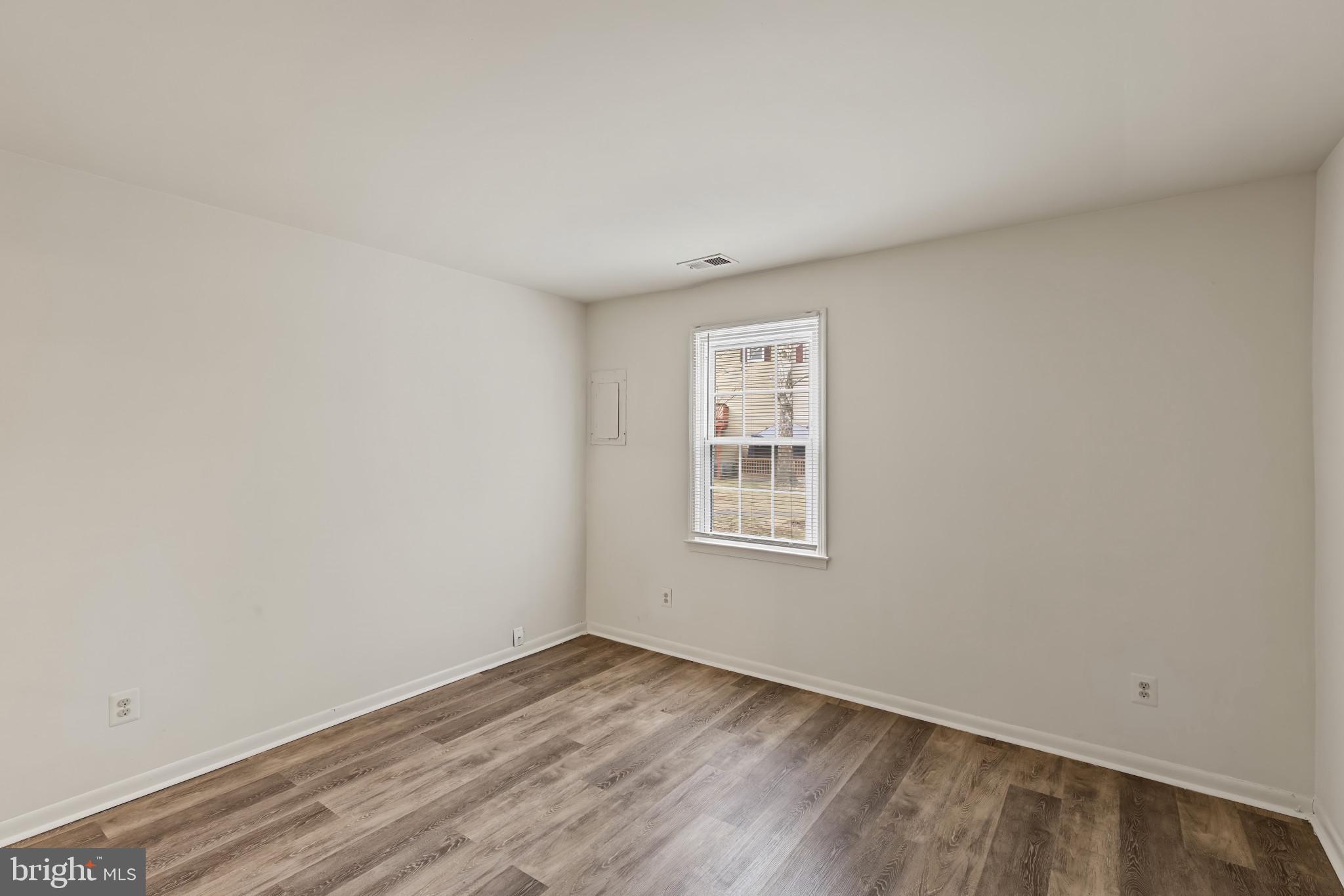 10 Kettle Court, Unit 76F Windsor Mill, MD 21244 - Photo 26 of 29 an empty room with a window