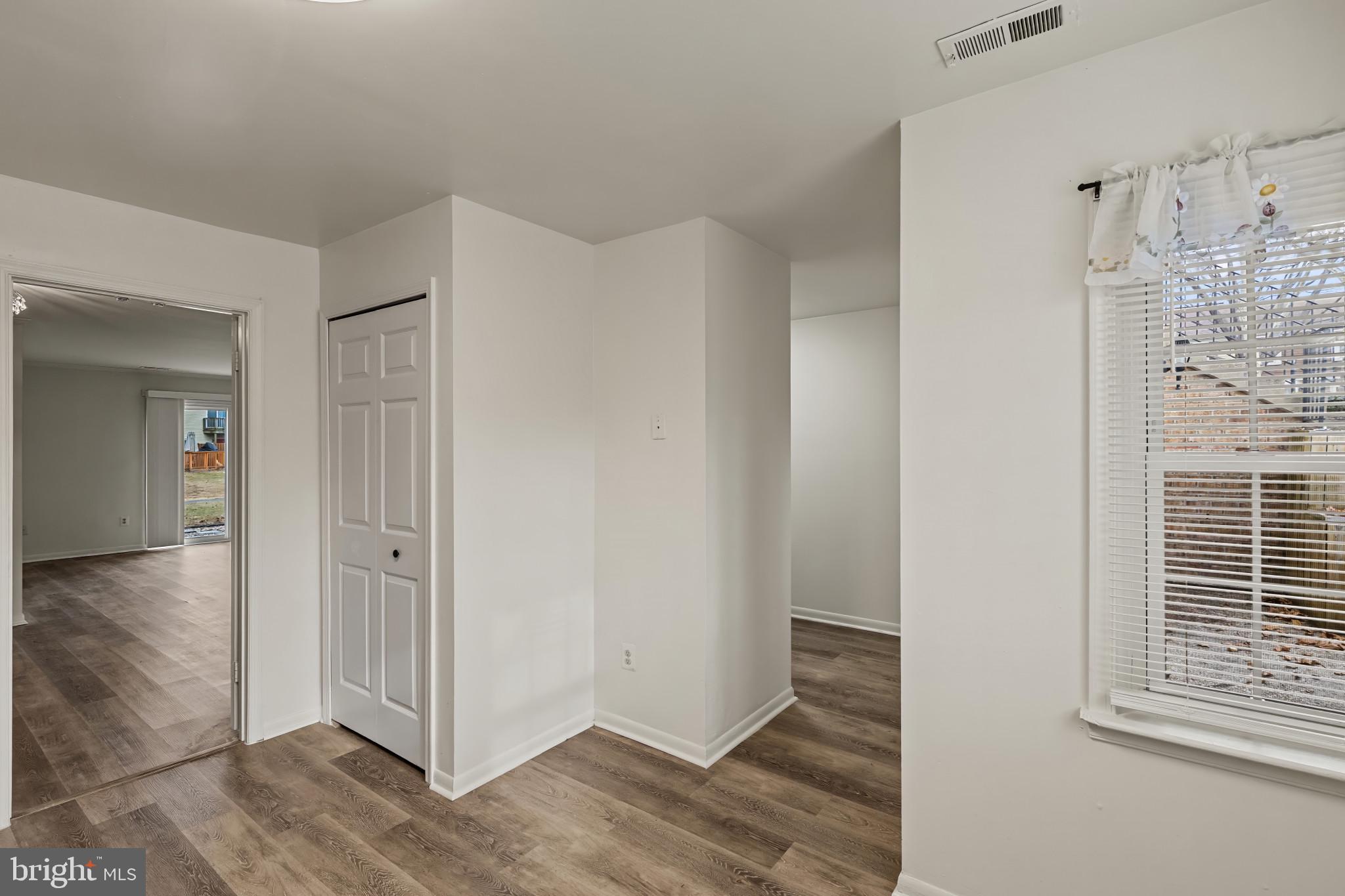 10 Kettle Court, Unit 76F Windsor Mill, MD 21244 - Photo 10 of 29 a view of entryway with wooden floor