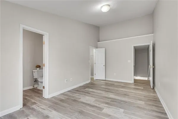 a bathroom with a sink vanity and a mirror