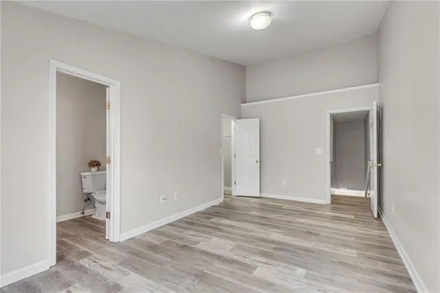 a bathroom with a sink vanity and a mirror