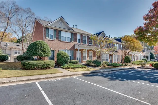 a front view of a building with street view