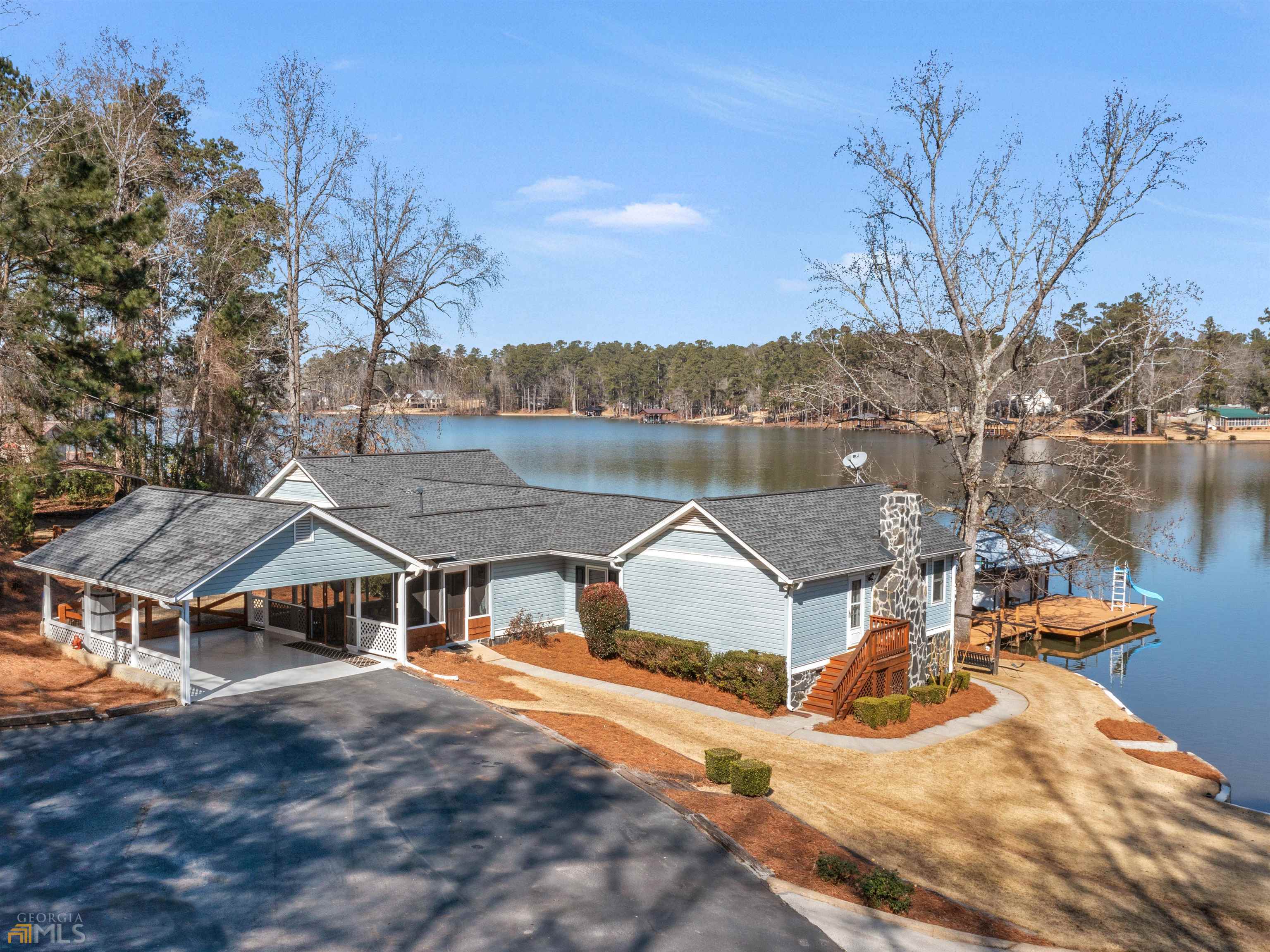 104 Bluebird Lane Jackson, GA 30233 - Photo 1 of 1 a aerial view of a house with swimming pool and mountains