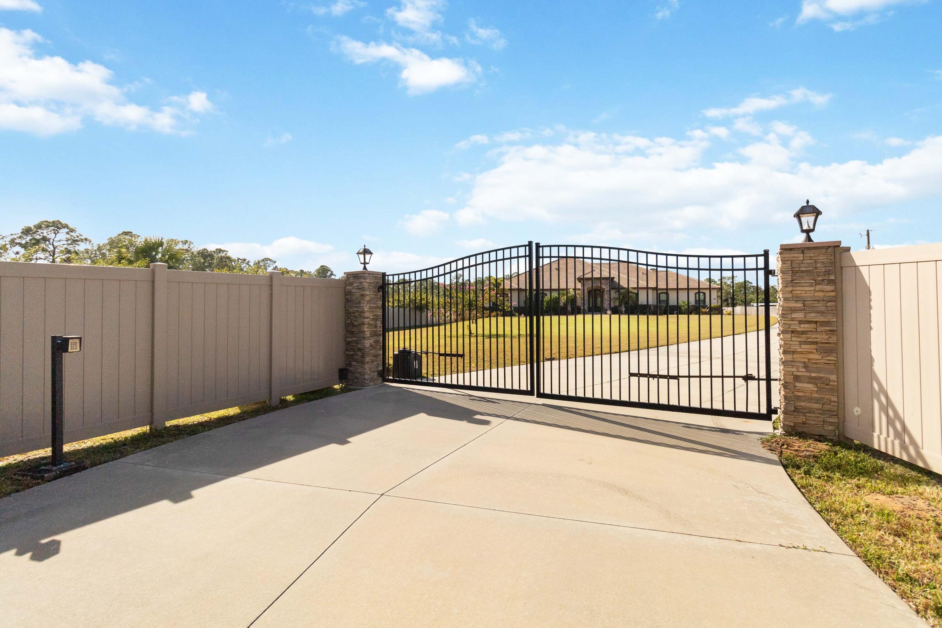 3640 Corey Road Grant Valkaria, FL 32950 - Photo 2 of 77 a view of a wrought fence