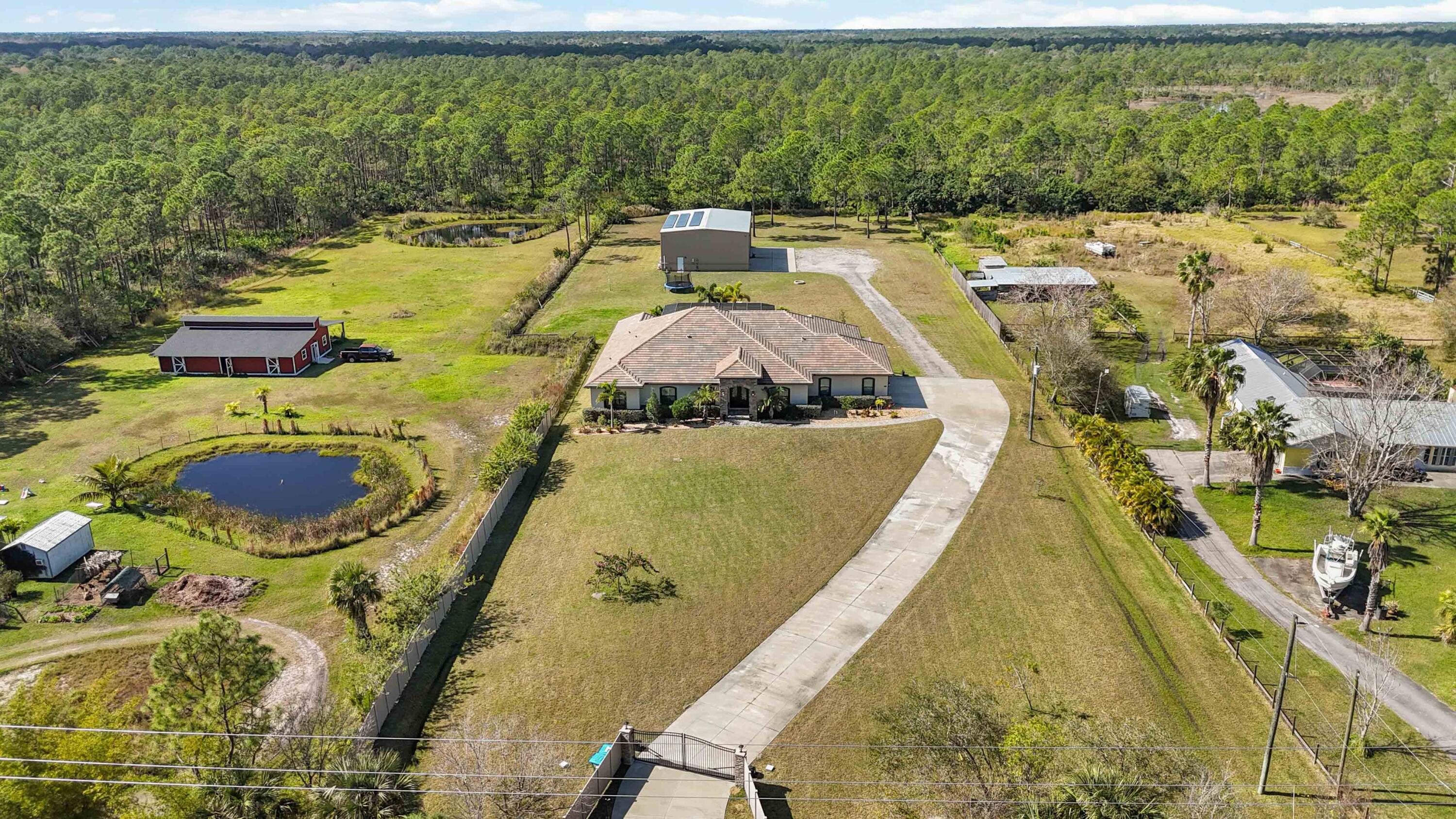 3640 Corey Road Grant Valkaria, FL 32950 - Photo 10 of 77 a view of swimming pool with seating area