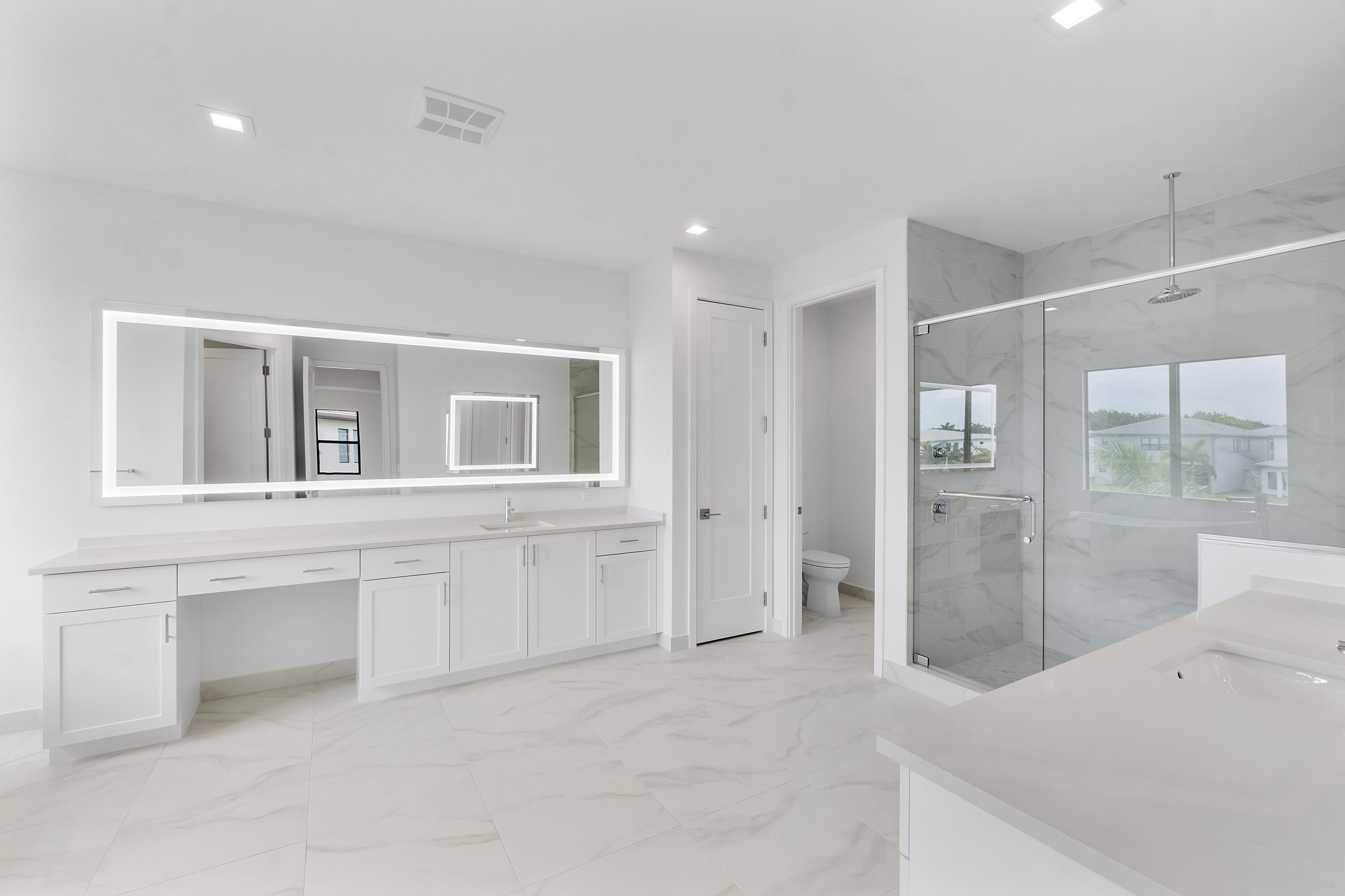 9322 Sunflower Mdw Road Boca Raton, FL 33434 - Photo 35 of 87 a living room with stainless steel appliances kitchen island granite countertop a refrigerator and cabinets