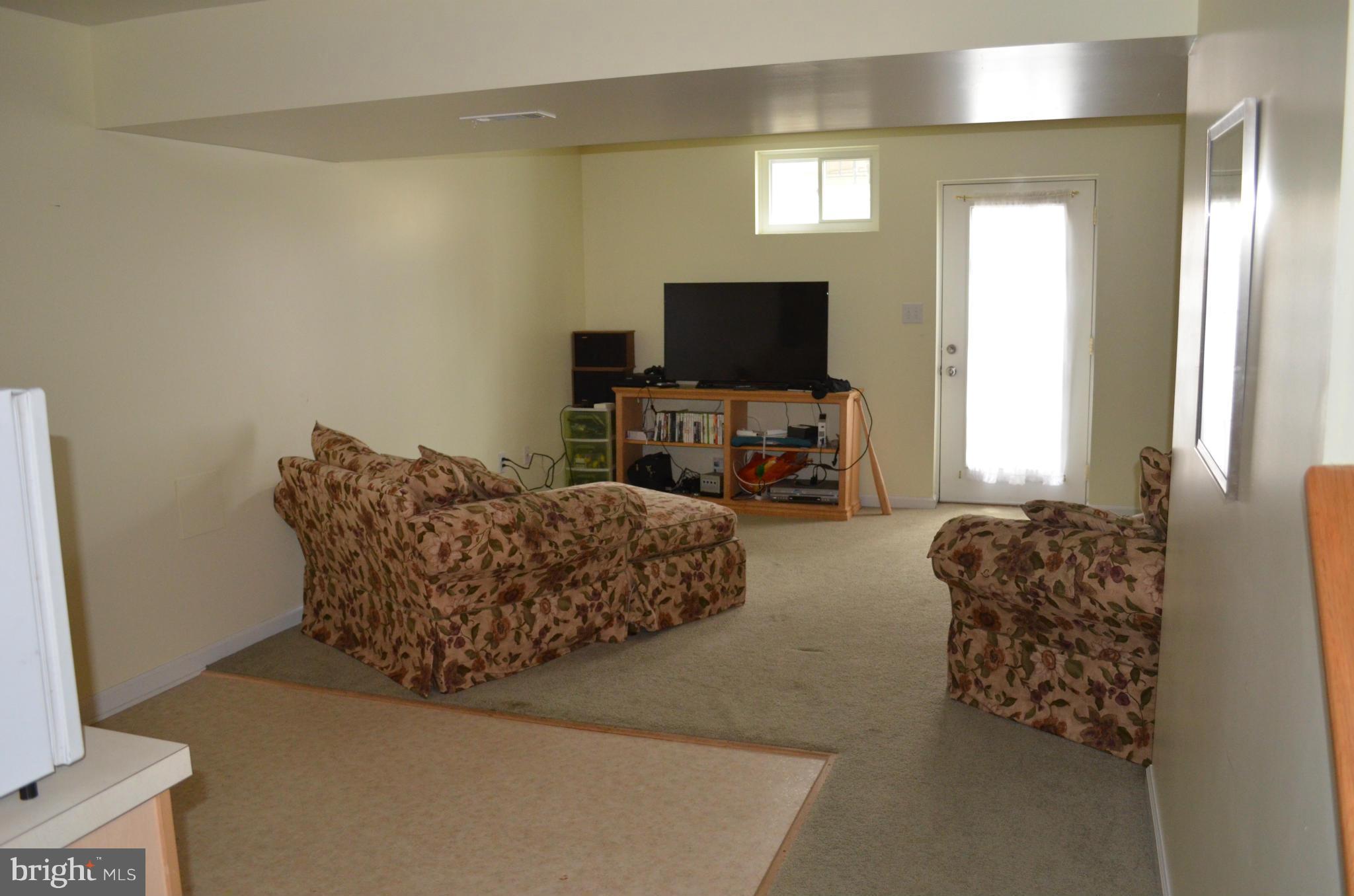 6318 Spring Forest Road Frederick, MD 21701 - Photo 22 of 30 Walk-up lower level with wet bar