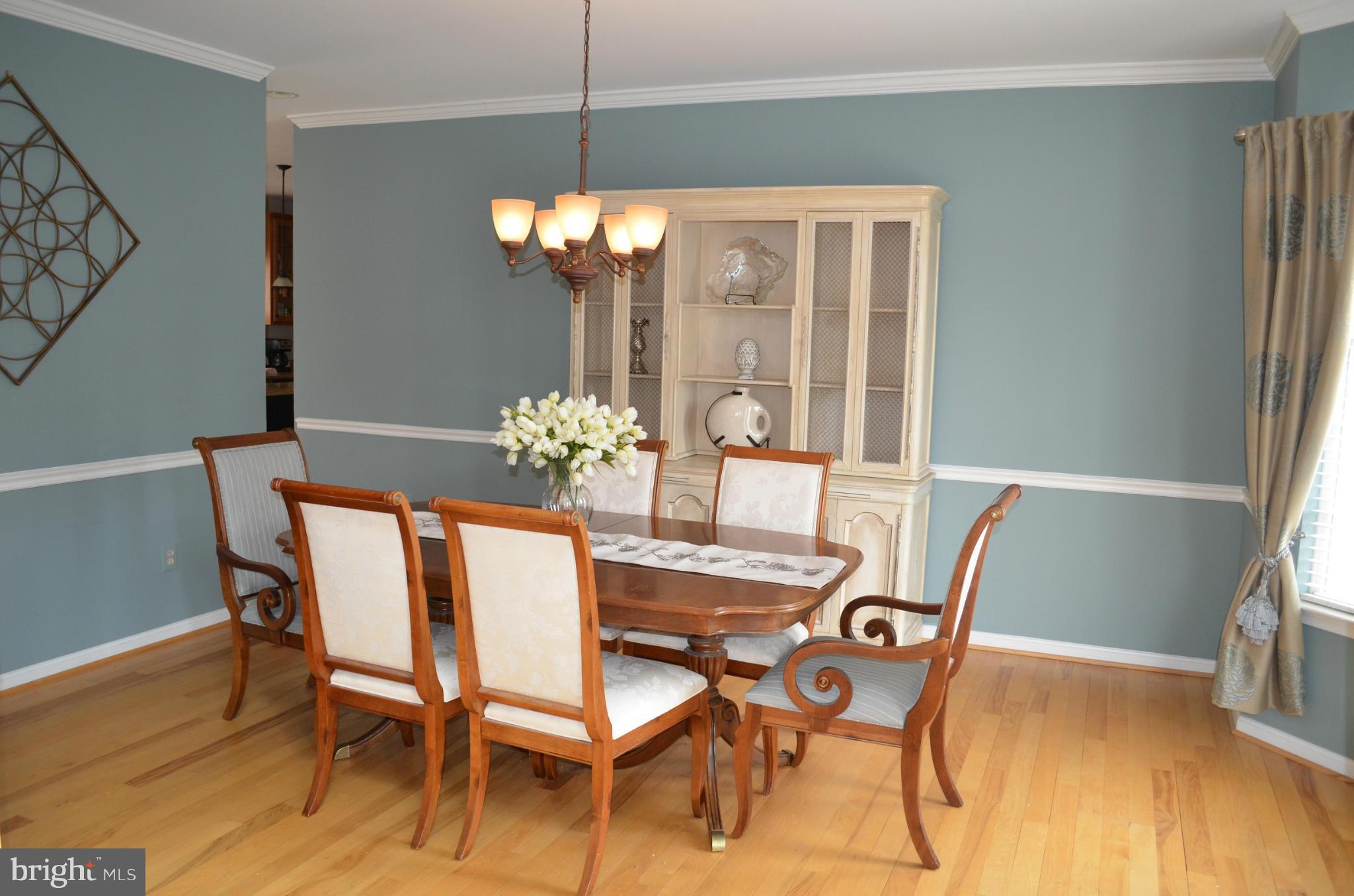 6318 Spring Forest Road Frederick, MD 21701 - Photo 5 of 30 Dining Room with hardwood and bay window