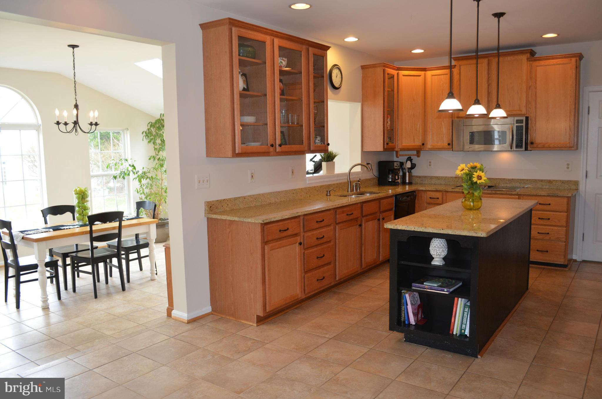 6318 Spring Forest Road Frederick, MD 21701 - Photo 8 of 30 Fabulous kitchen with granite, 42" cabinetry