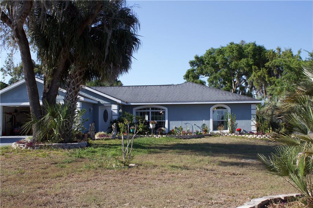 9981 Southeast Sunset Harbor Road Summerfield, FL 34491 - Photo 1 of 1 Front of Home