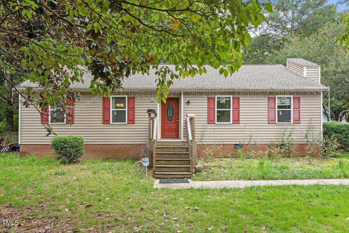 3605 Satellite Court Raleigh, NC 27604 - Photo 1 of 37 a front view of a house with a yard