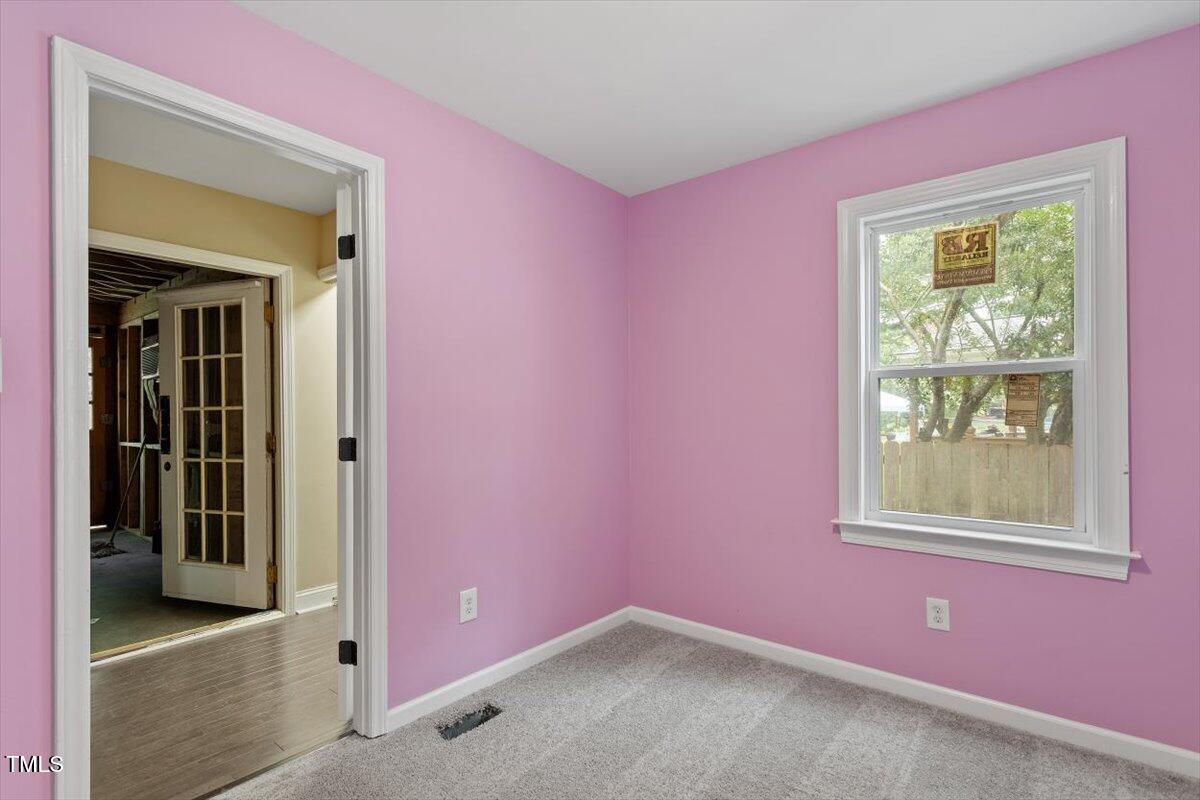3605 Satellite Court Raleigh, NC 27604 - Photo 15 of 37 an empty room with windows and closet