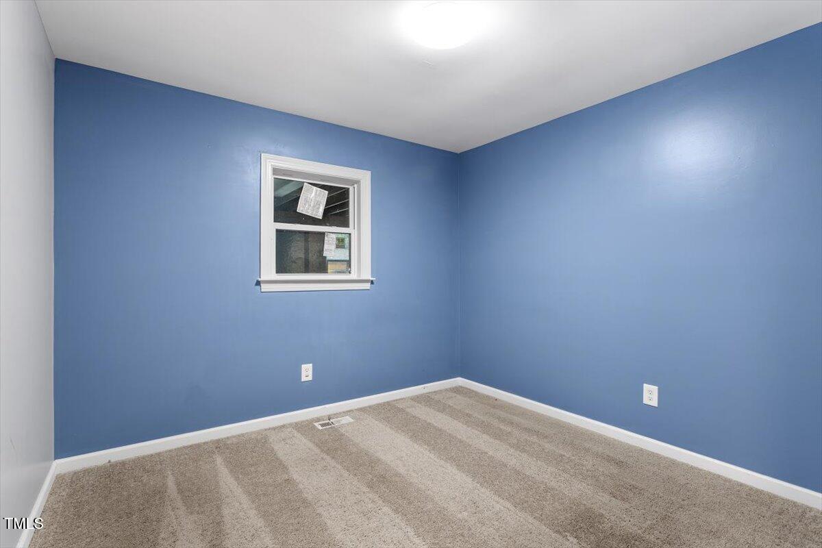 3605 Satellite Court Raleigh, NC 27604 - Photo 17 of 37 a view of an empty room with a window