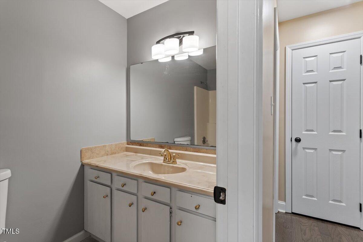 3605 Satellite Court Raleigh, NC 27604 - Photo 19 of 37 a bathroom with a sink and a mirror