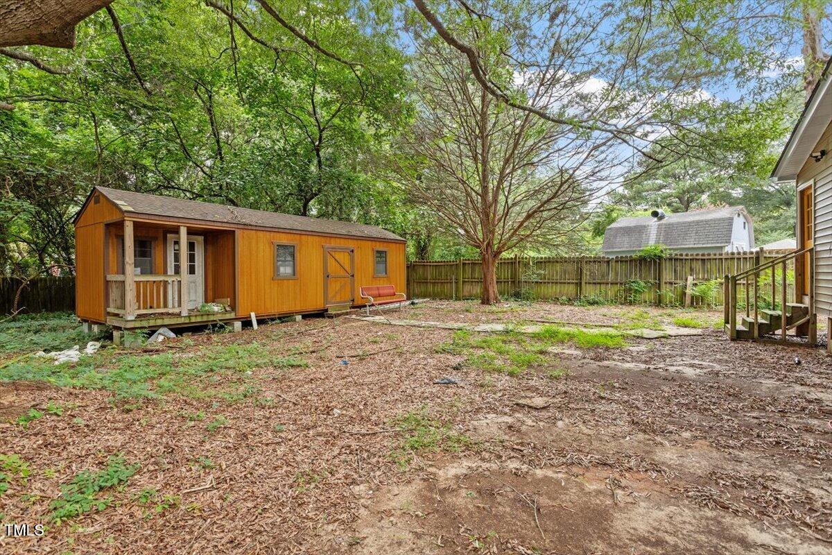 3605 Satellite Court Raleigh, NC 27604 - Photo 30 of 37 a view of a house with a backyard