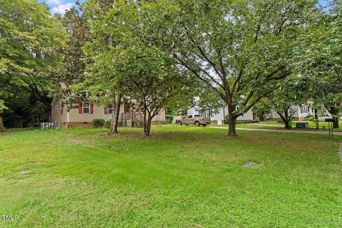 3605 Satellite Court Raleigh, NC 27604 - Photo 4 of 37 a huge green field with lots of trees