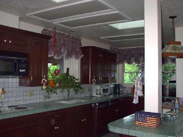 595 Dog Valley Road Verdi, NV 89439 - Photo 4 of 6 a kitchen with sink and cabinets