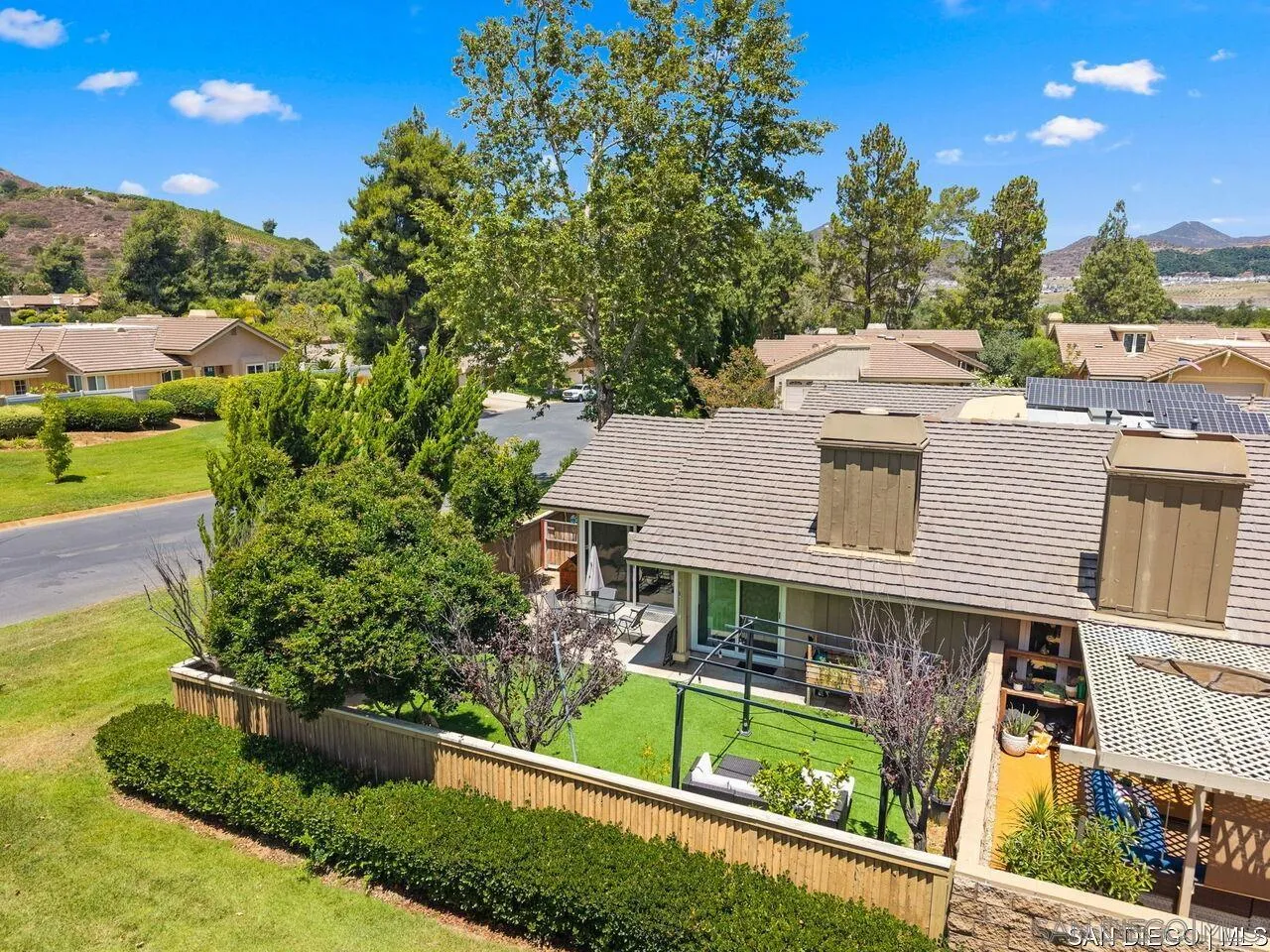 4309 Diegos Court Fallbrook, CA 92028 - Photo 20 of 33 a view of a house with a yard from a balcony