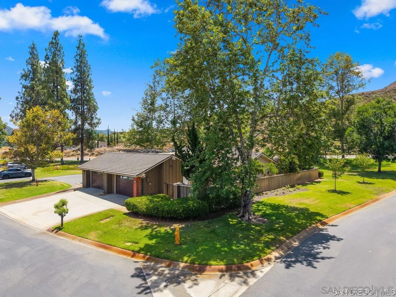 4309 Diegos Court Fallbrook, CA 92028 - Photo 22 of 33 a view of a house with swimming pool and yard