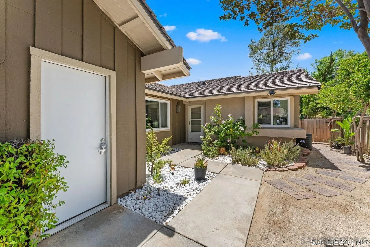 4309 Diegos Court Fallbrook, CA 92028 - Photo 25 of 33 a view of a house with a yard