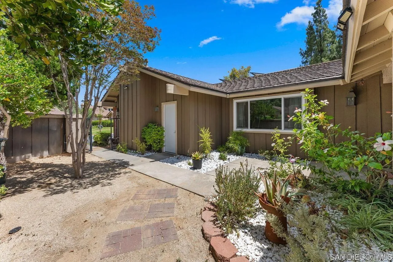 4309 Diegos Court Fallbrook, CA 92028 - Photo 26 of 33 a front view of a house with garden