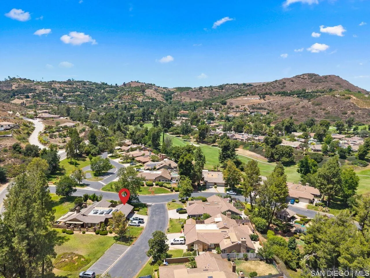 4309 Diegos Court Fallbrook, CA 92028 - Photo 29 of 33 an aerial view of residential houses with outdoor space and trees