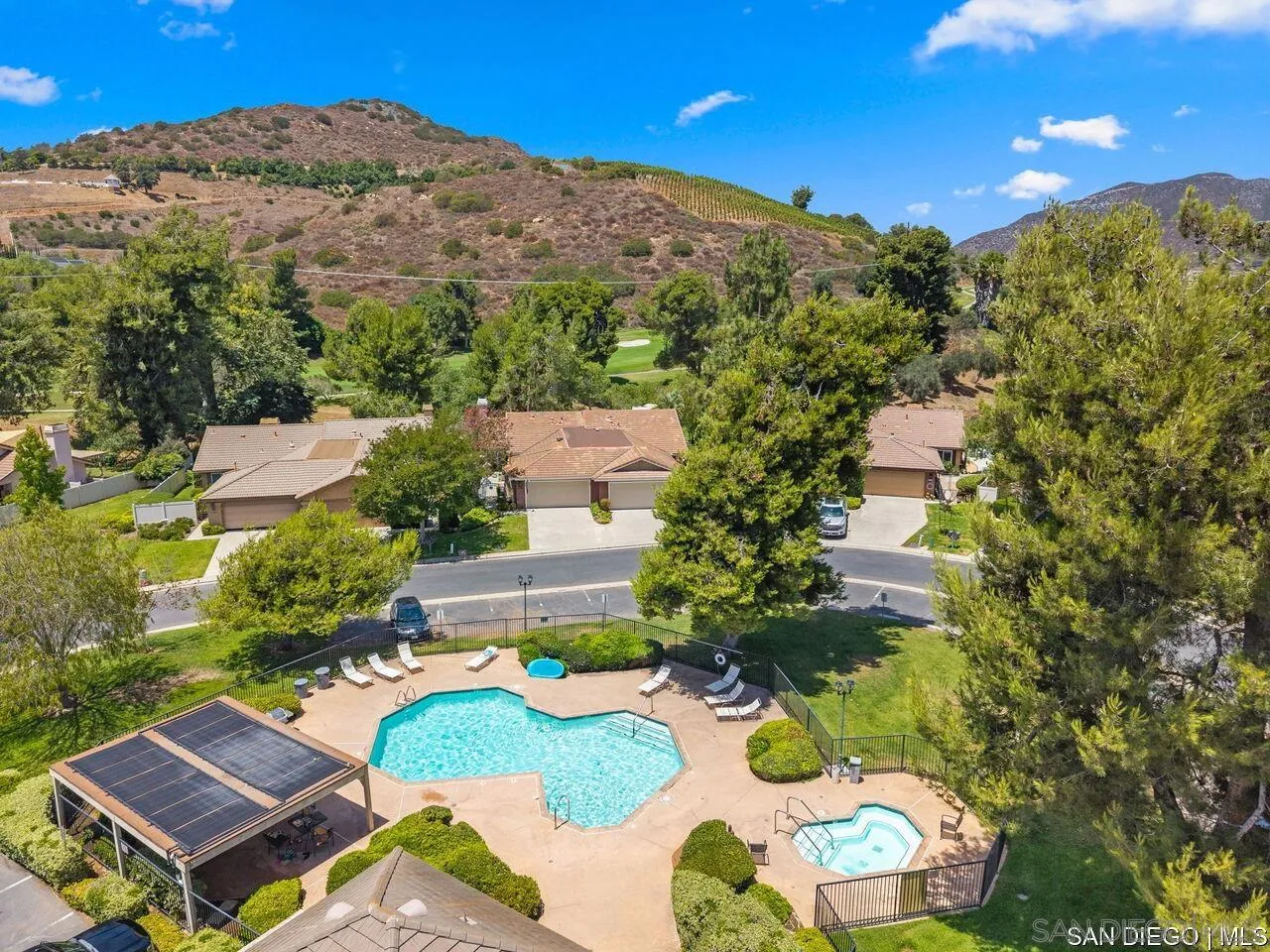 4309 Diegos Court Fallbrook, CA 92028 - Photo 31 of 33 a view of a swimming pool with a patio