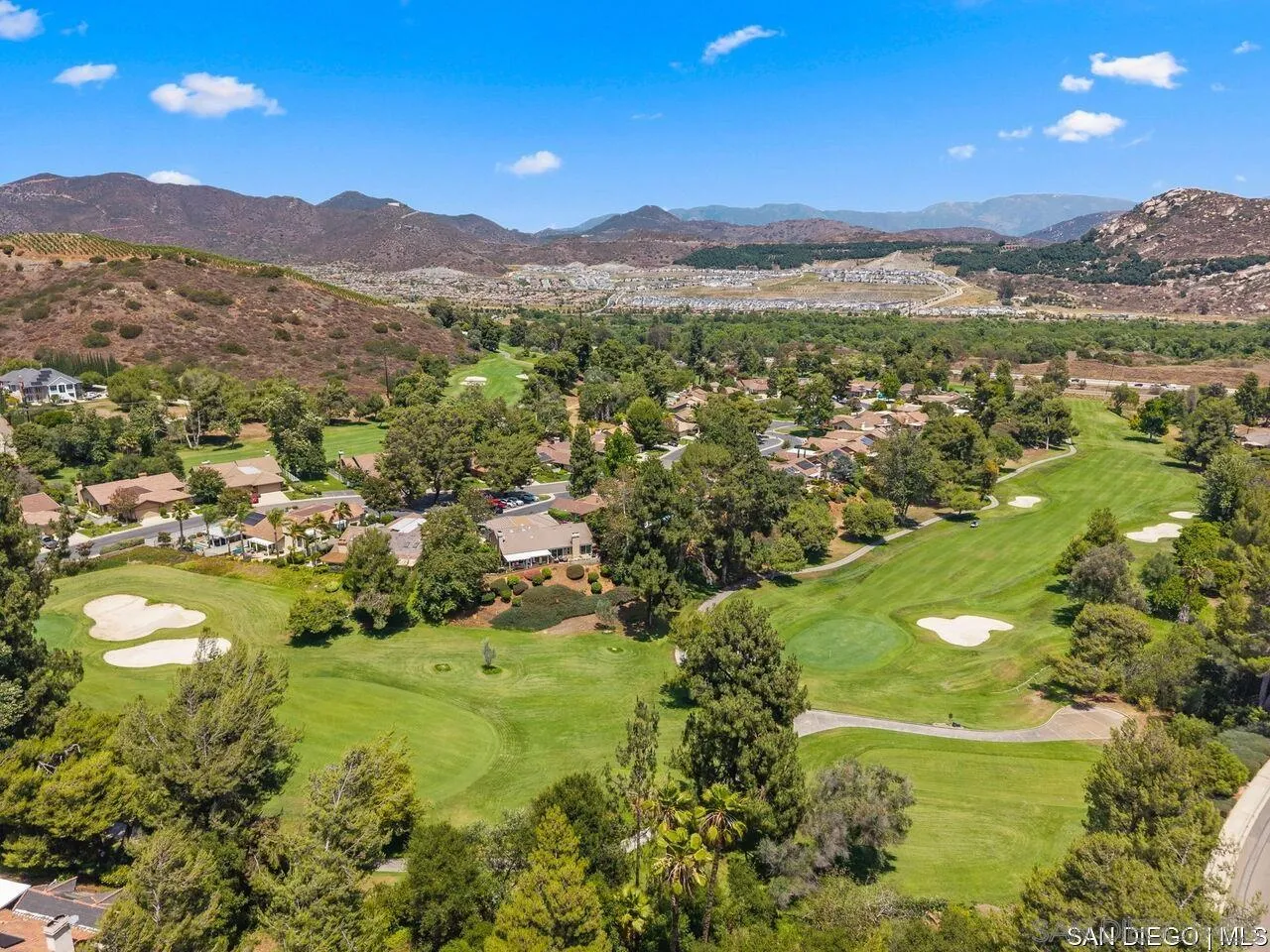 4309 Diegos Court Fallbrook, CA 92028 - Photo 33 of 33 a view of a city with mountains in the background