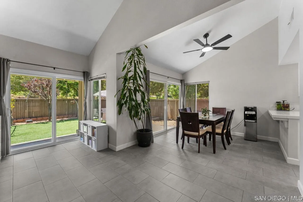 4309 Diegos Court Fallbrook, CA 92028 - Photo 5 of 33 a dining room with furniture and a floor to ceiling window