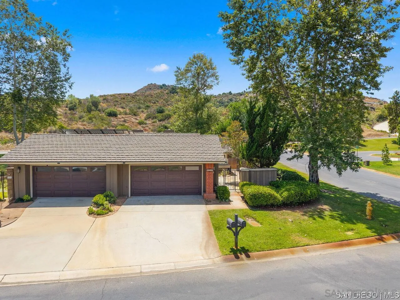 4309 Diegos Court Fallbrook, CA 92028 - Photo 6 of 33 a view of a house with a garden and pathway
