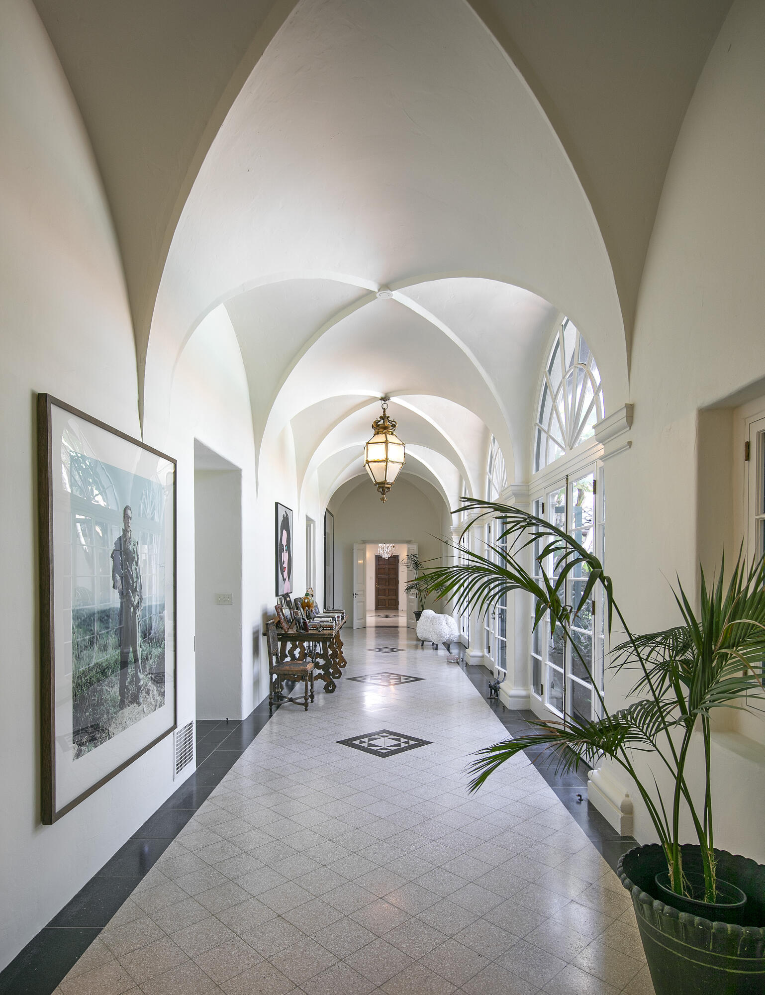 2925 Sycamore Canyon Road Montecito, CA 93108 - Photo 3 of 19 a view of a hallway with a potted plant