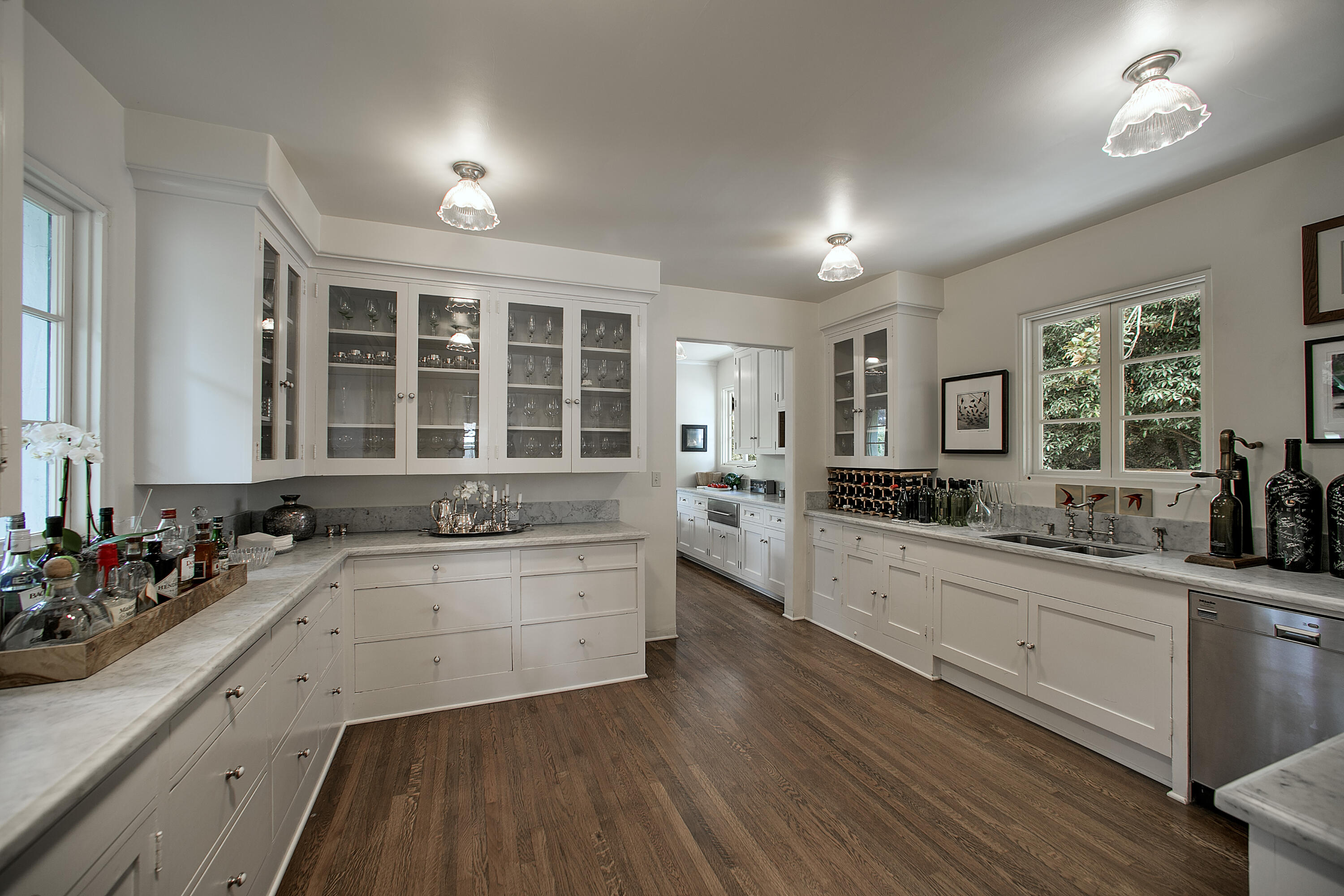 2925 Sycamore Canyon Road Montecito, CA 93108 - Photo 8 of 19 a large kitchen with a lot of counter space and wooden floor
