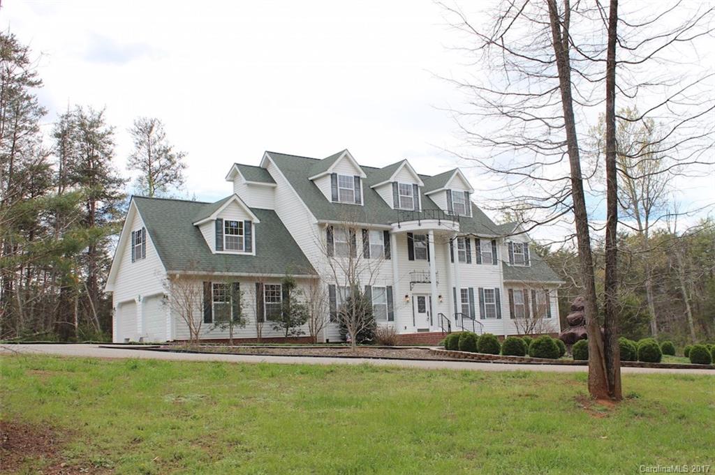 136 Scherer Drive Rutherfordton, NC 28139 - Photo 1 of 24 a front view of house with yard and green space