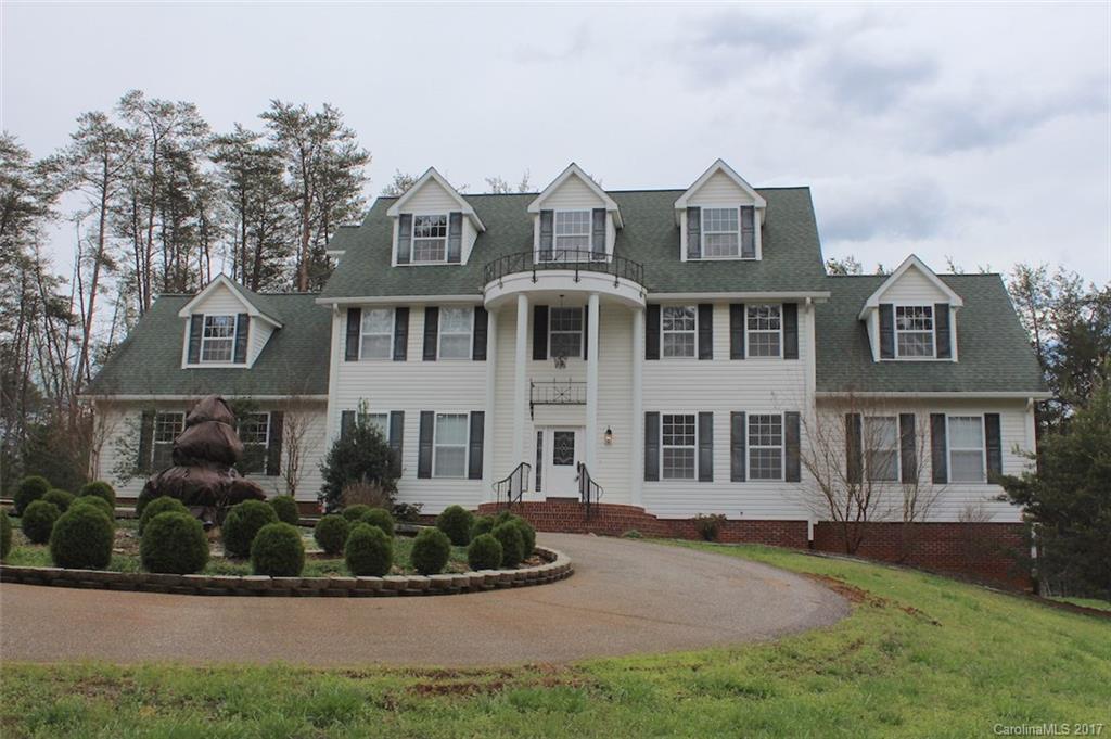 136 Scherer Drive Rutherfordton, NC 28139 - Photo 2 of 24 front view of a house with a yard